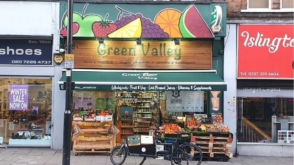 Outside of Green Valley Wholefoods where you can buy sea moss gel. Essex Road, Islington. 