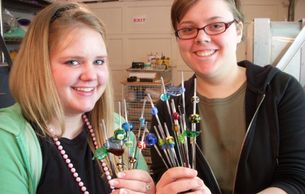 Eastlake High School Seniors Kaye and Alexa learning Glass Beadmaking