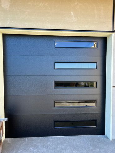 Amarr, Lincoln, Black Flush Panel with Slim Tinted Windows down the Side & an Rvalue of 9.05