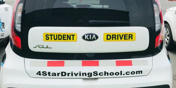 Clearly marked "Student Driver" on all training vehicles