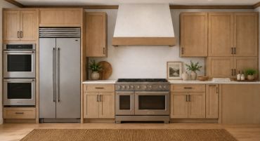 Modern kitchen with wooden cabinets and stainless steel appliances.