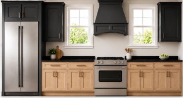 Modern kitchen with black and wood cabinetry and stainless steel appliances.