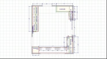 Kitchen layout plan with dimensions and cabinets.