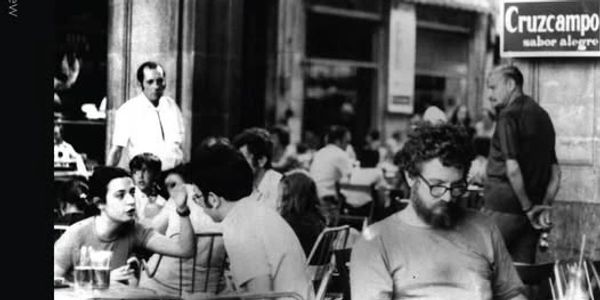 Gerald Locklin sitting in an Italian cafe. Chiron Review Issue #127 cover, Fall, 2022.