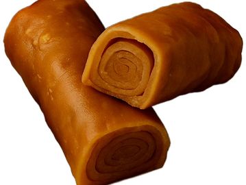 Slow-cooked Jachnun roll—golden, flaky, and rich. A traditional Yemenite weekend breakfast favorite.