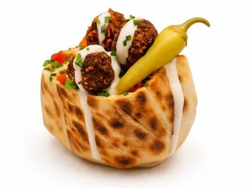 Falafel in fresh pita with tahini, top pick for Mediterranean food lover and veggie fans in Winnipeg