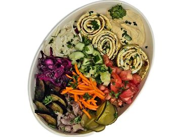 Fresh vegetable omelet bowl with hummus, Israeli salads and pickles in Winnipeg. The Green Falafel