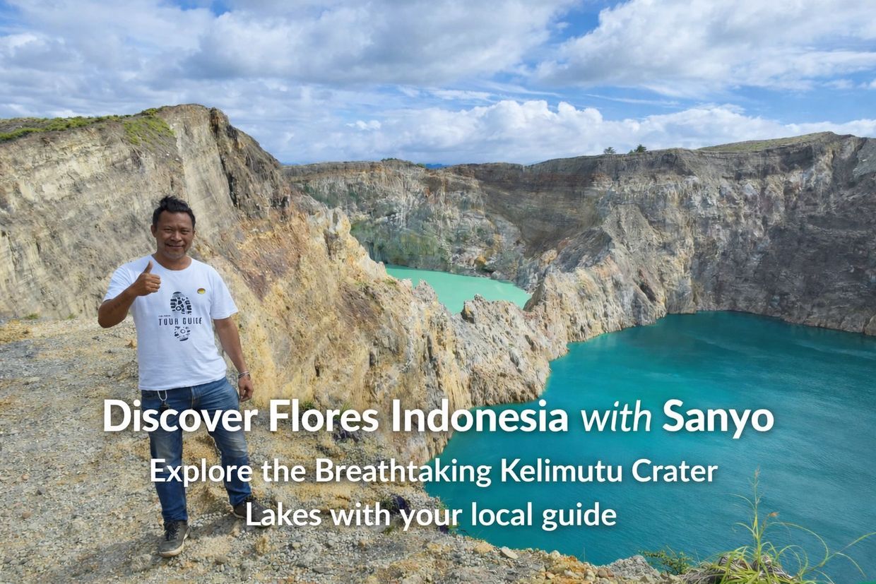 A local guide gives a thumbs up at the colorful Kelimutu Crater Lakes in Flores, Indonesia.