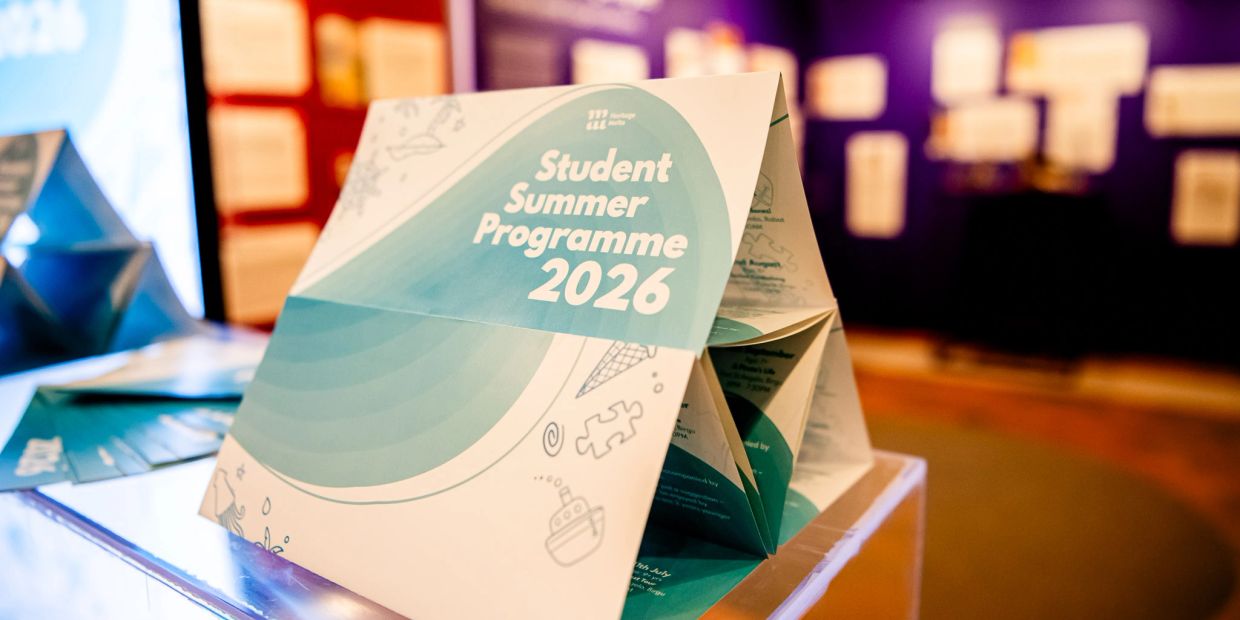 Brochure for a Student Summer Programme 2026 displayed on a table.