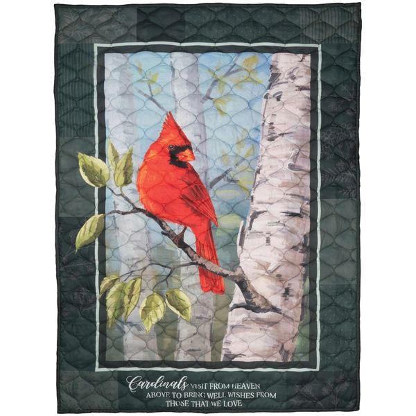 Quilt featuring a bright red cardinal on a branch with a birch tree background.