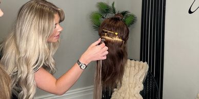 Hair extension training course in progress - nano application 