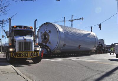 Oversize load on an extendable trailer.