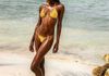 Height: 5' 9" Bust: 34 Cup: C  Waist: 23" Hips: 34" Dress: 2-4 Shoe: 8.5 Hair: Black  Eyes: Brown