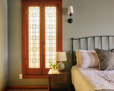 Guest room at Madeira House interior design by Moksa Studio. Photography by Matchull Summers.