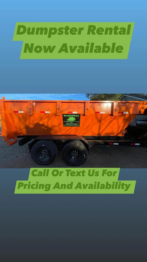 Bright orange dumpster rental now available, contact for pricing and availability.