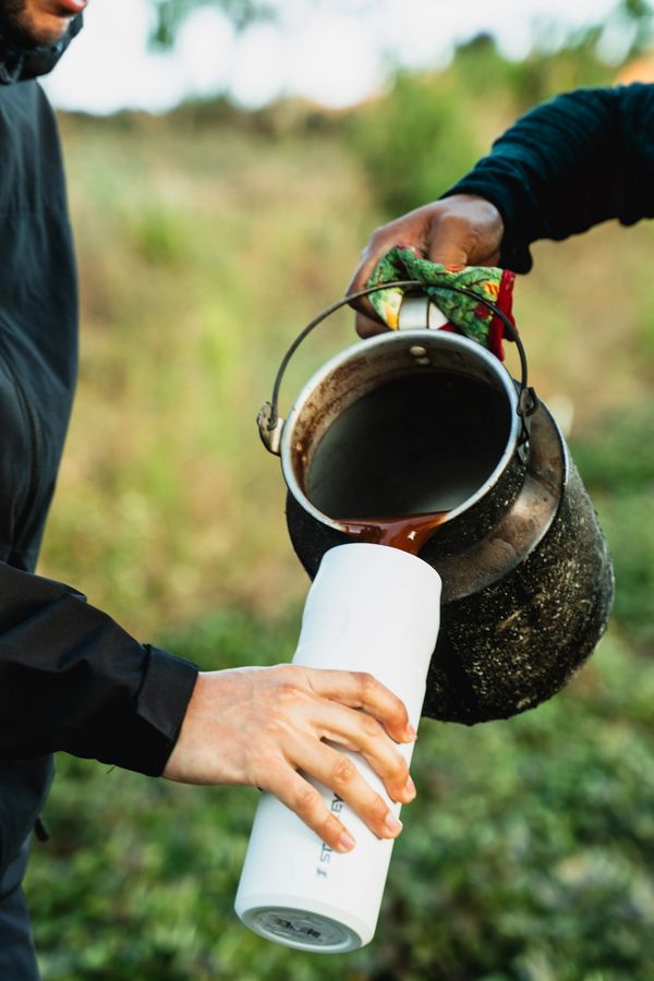 Pouring coffee outdoors