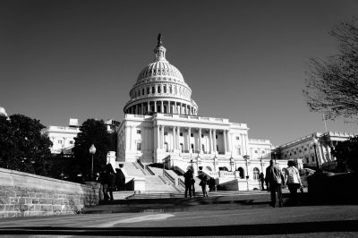 Black and white photo of the U.S. Capitol building.