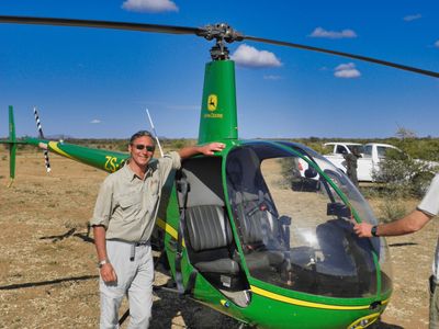 Alessandro next to a helicopter in Marataba South Africa