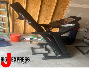 treadmill moved from a customer's basement 