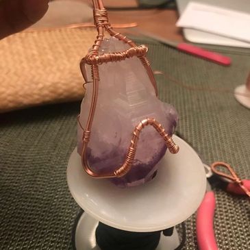 Hand-made wellness accessories, wire-wrapped gemstones and Essential oil diffuser jewelry.