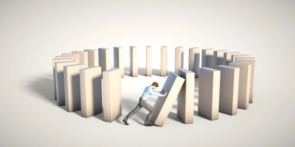 Domino Effect - Initiative Starter Executive Coaching starts with one push to create change.