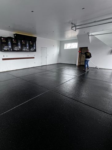 Durable epoxy garage floor with full broadcast flake finish - ECM Epoxy Flooring