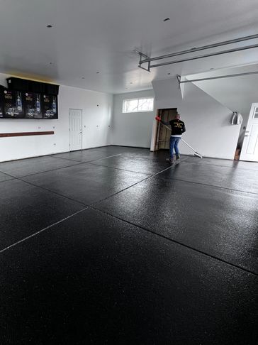 Durable epoxy garage floor with full broadcast flake finish - ECM Epoxy Flooring