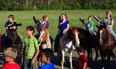 Laser tag on horseback