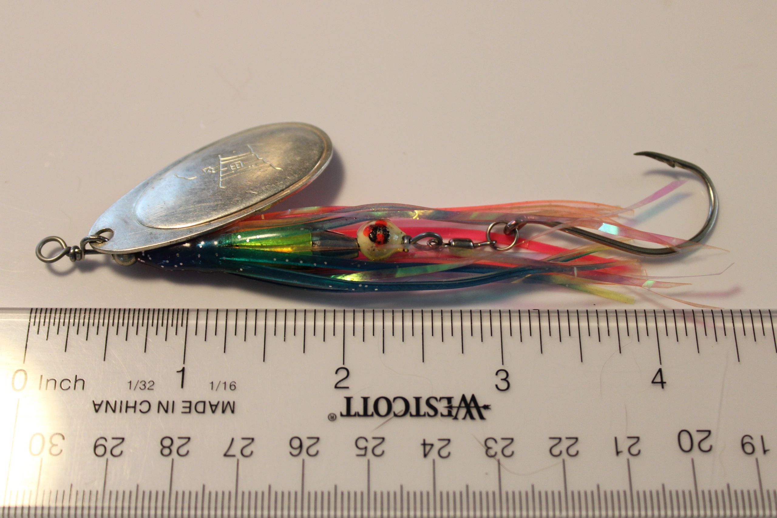Salmon hoochie spinners, make your own, it catches all game fish