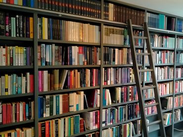 Library room with rolling ladder, NW6
