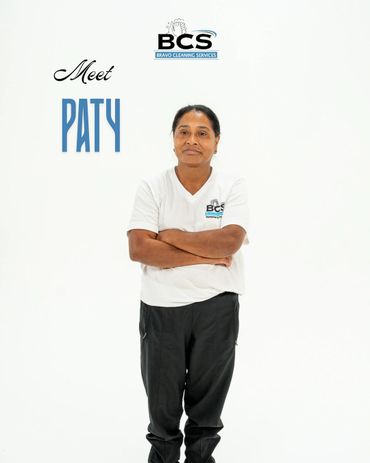 Woman named Paty posing confidently for Bravo Cleaning Services.