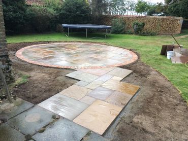 sandstone patio with large bullseye 