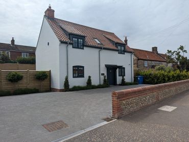 new builds brancaster with flint garden wall
