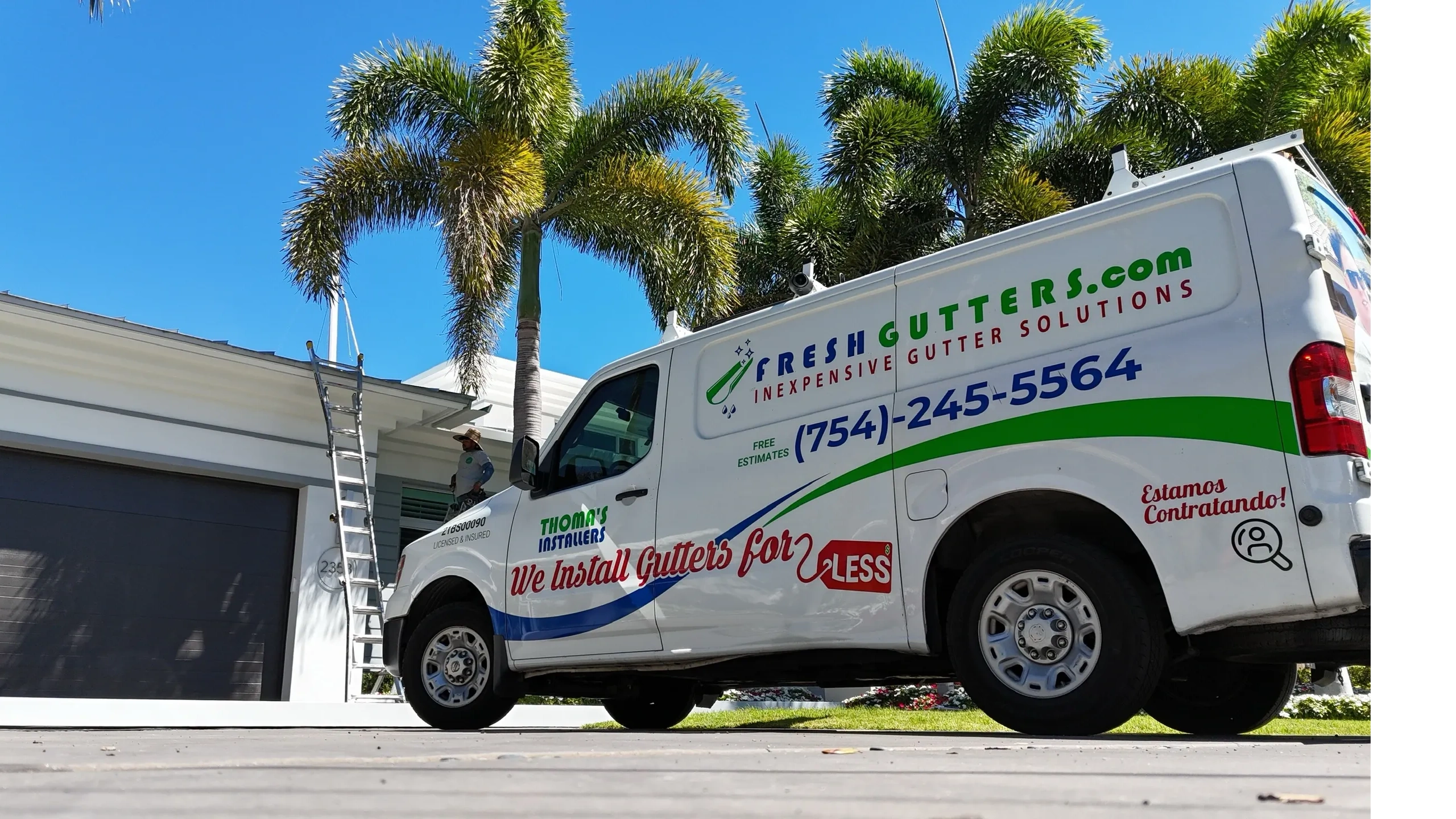 Fresh Gutter technician installing aluminum rain gutters on a single-story home.