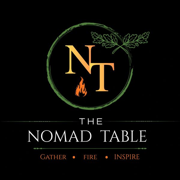 Logo for The Nomad Table with gathering, fire, and inspiration themes.