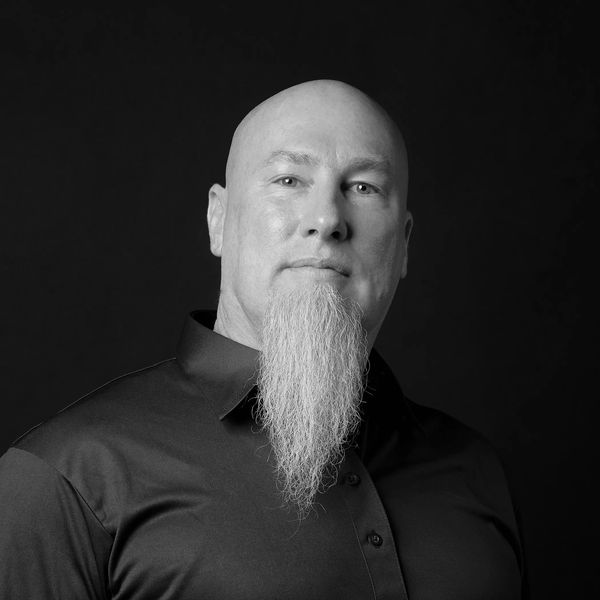 Photographic portrait of David Kujda taken in 2025.