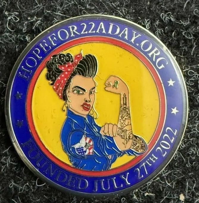 Commemorative token for Hope for 22 Day with Rosie the Riveter image.