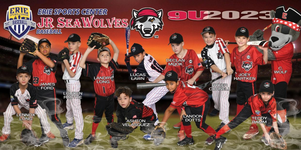 Youth baseball team Jr SeaWolves with mascot posing on field.