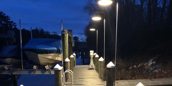 Custom dock lights installed in Henlopen Acres.