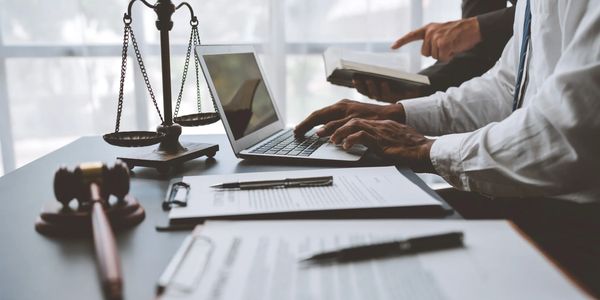 lawyer typing on computer