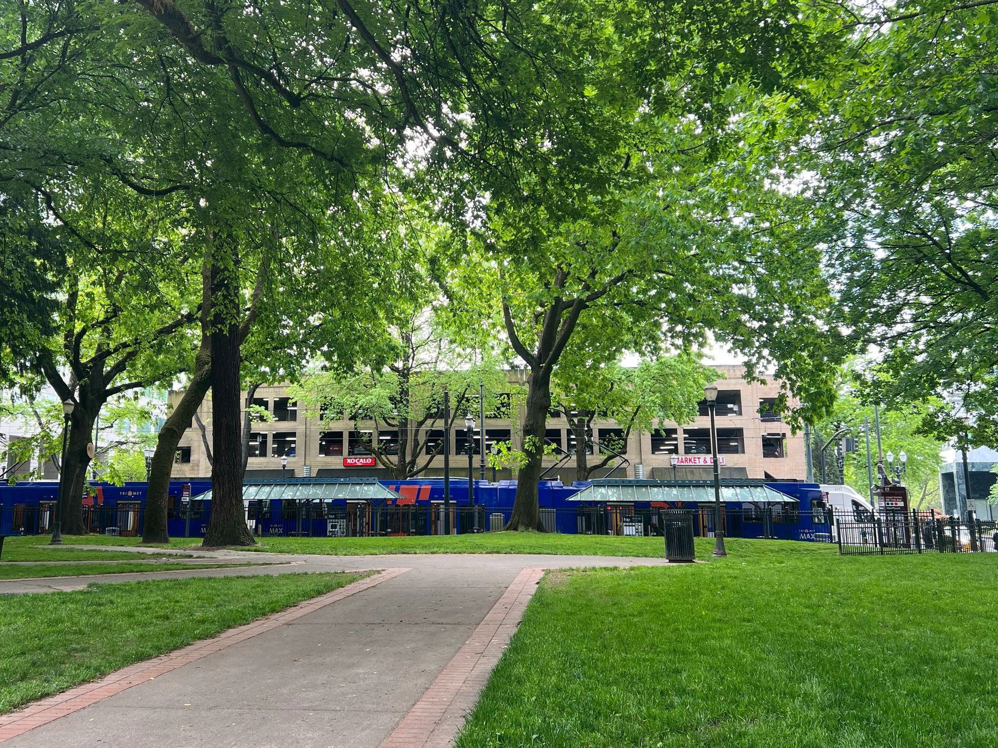 MAX train at 11th and Holladay stop, from Holladay Park. 
