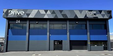 Drive Energy Australia building with blue and black accents.