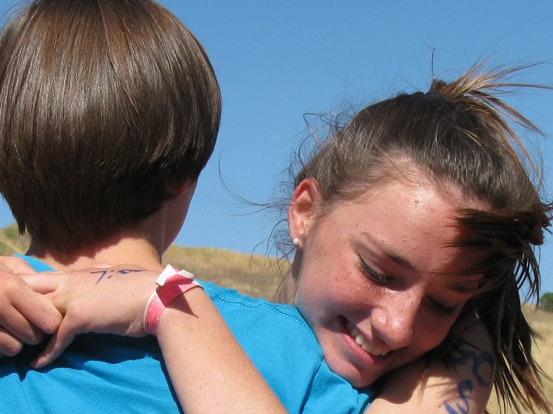 Nicole hugging her big brother Colin