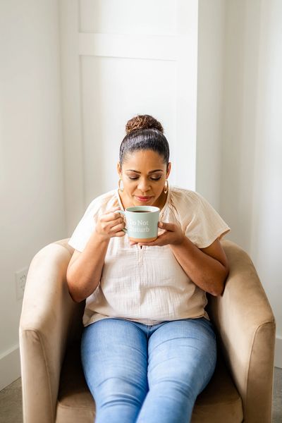 Tired mom drinking coffee 