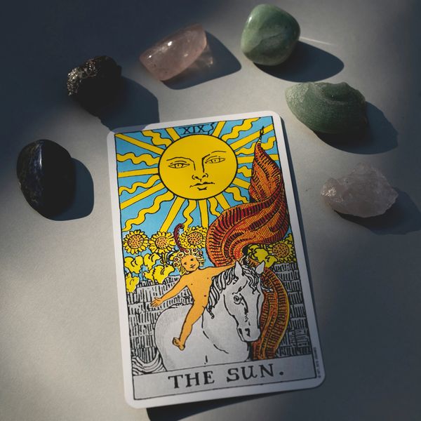 Tarot card and healing crystals