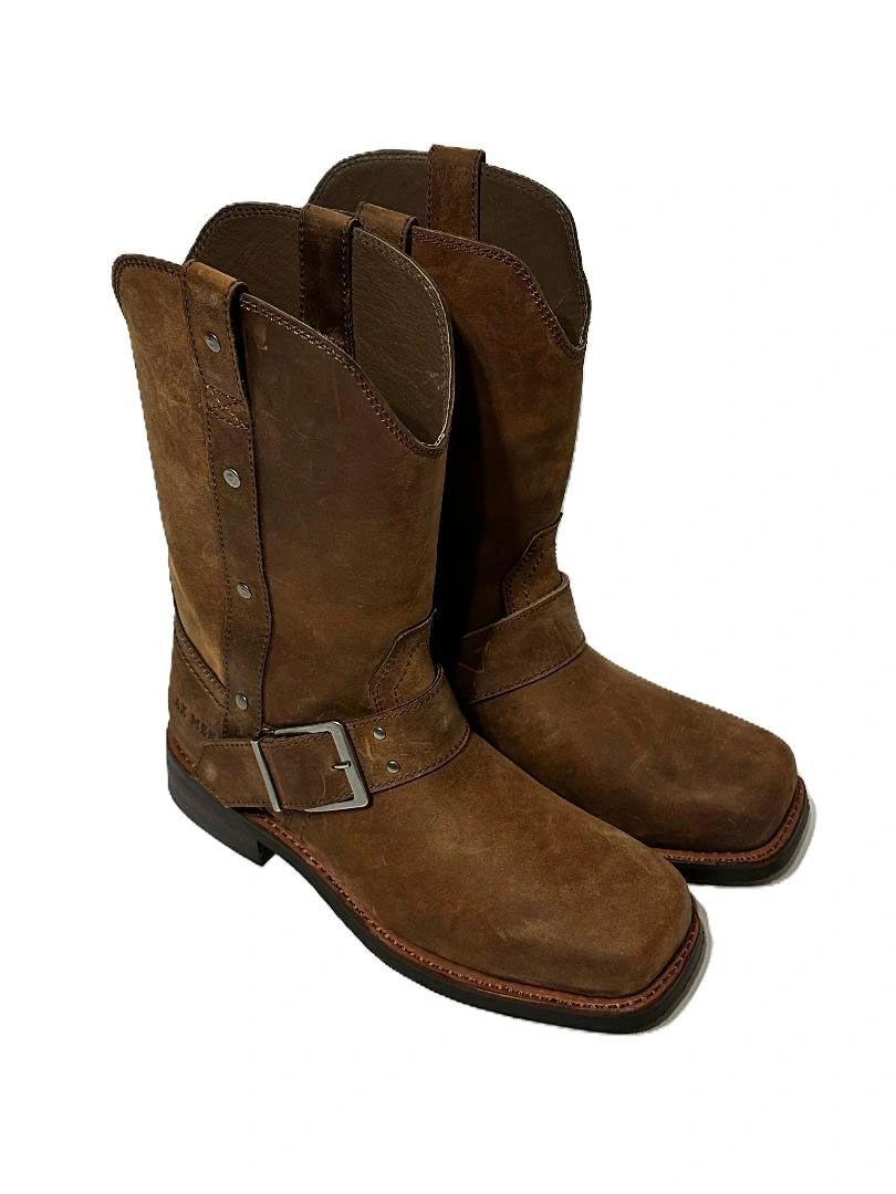 Brown leather cowboy boots with buckle detail.