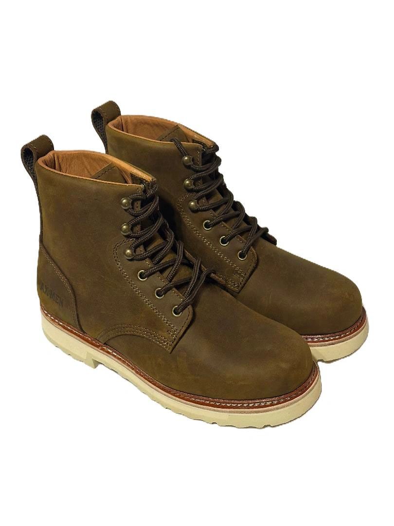 Brown leather work boots with white soles and black laces.