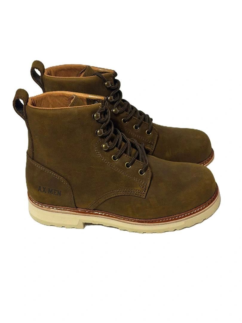 Brown leather ankle boots with white soles and black laces.