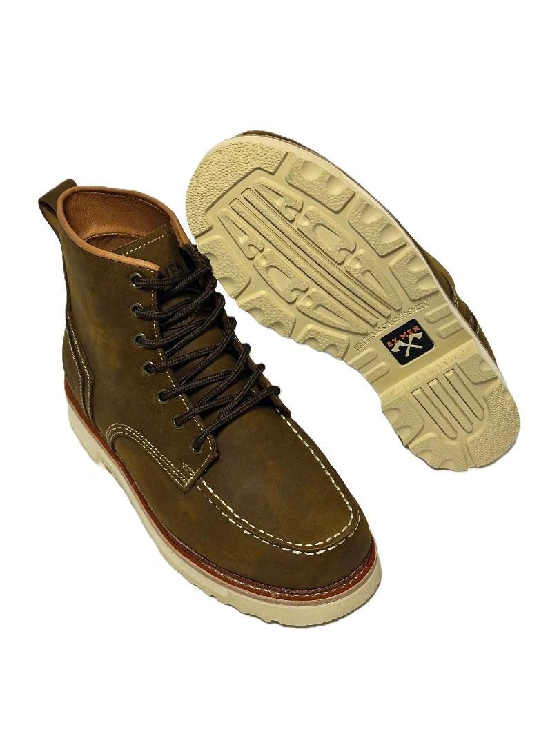 Brown leather boots with white stitching and rugged white soles.