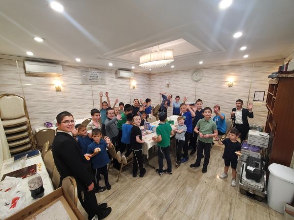 Group of children having a party indoors.